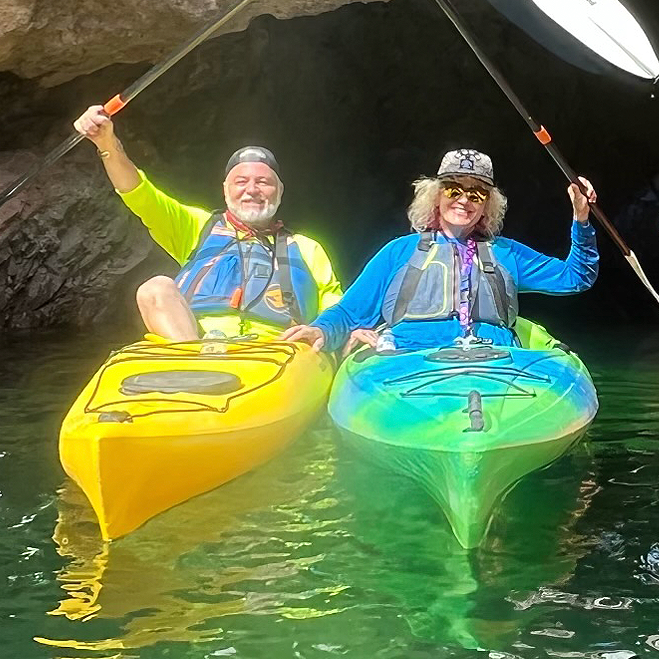 Abstract surrealist artist Vincent Burkhead kayaking with Dawn in San Diego