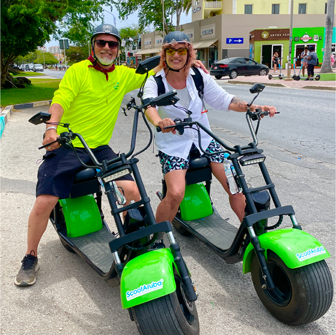 San Diego Artist Vincent Burkhead riding scooters in San Diego with his beautiful sweetheart, Dawn.